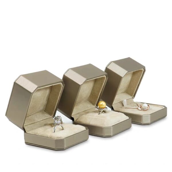 Octagonal PU leather plastic jewelry box golden