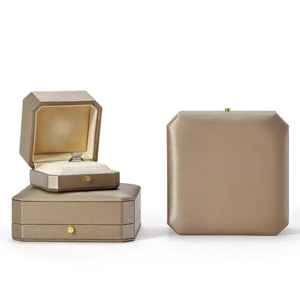 Octagonal PU leather plastic jewelry box golden cream